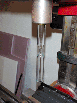 Hourglass piece, hanging in the milling machine