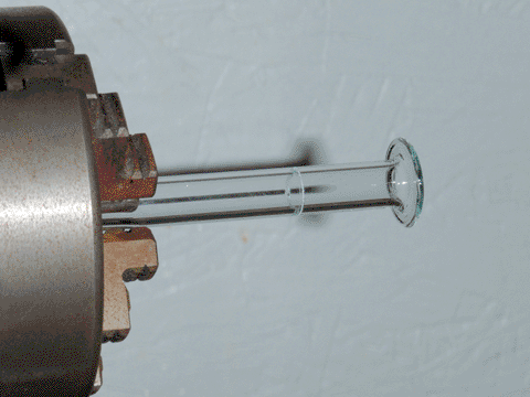 10mm tubing, scored and flared, in lathe